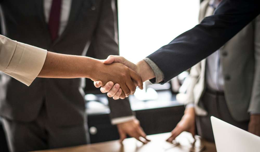 Absorción en Derecho Mercantil: Ejemplos y Tipos de Fusión